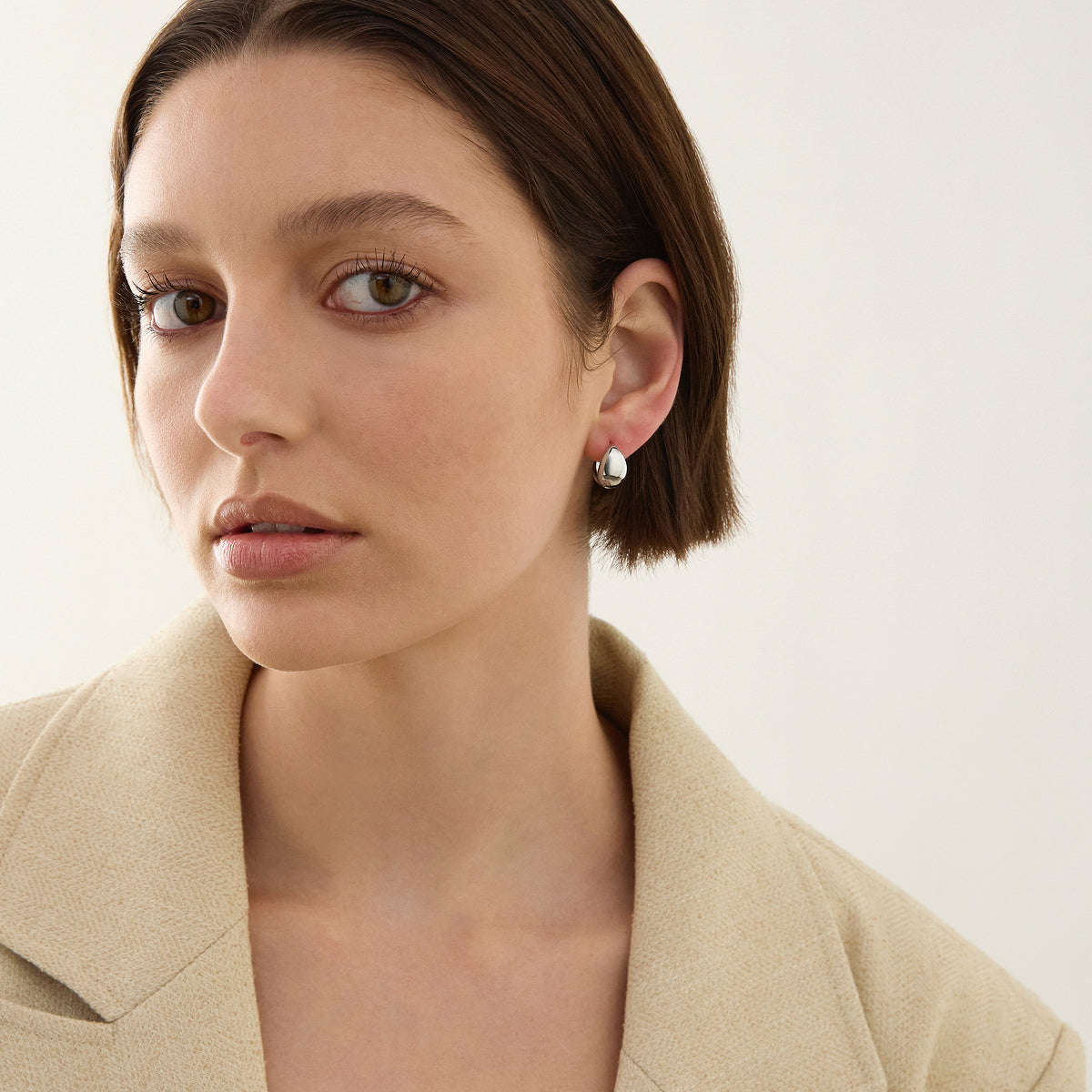 La Muse Huggie Earrings