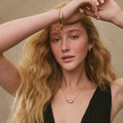 La Muse Huggie Earrings